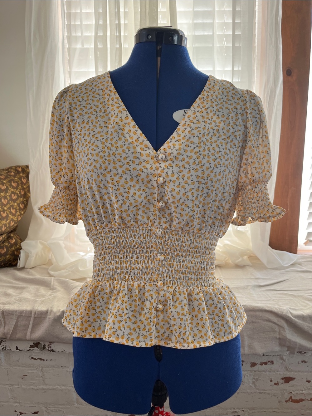 Sienna Sky White and Yellow Floral Smocked Peplum Blouse